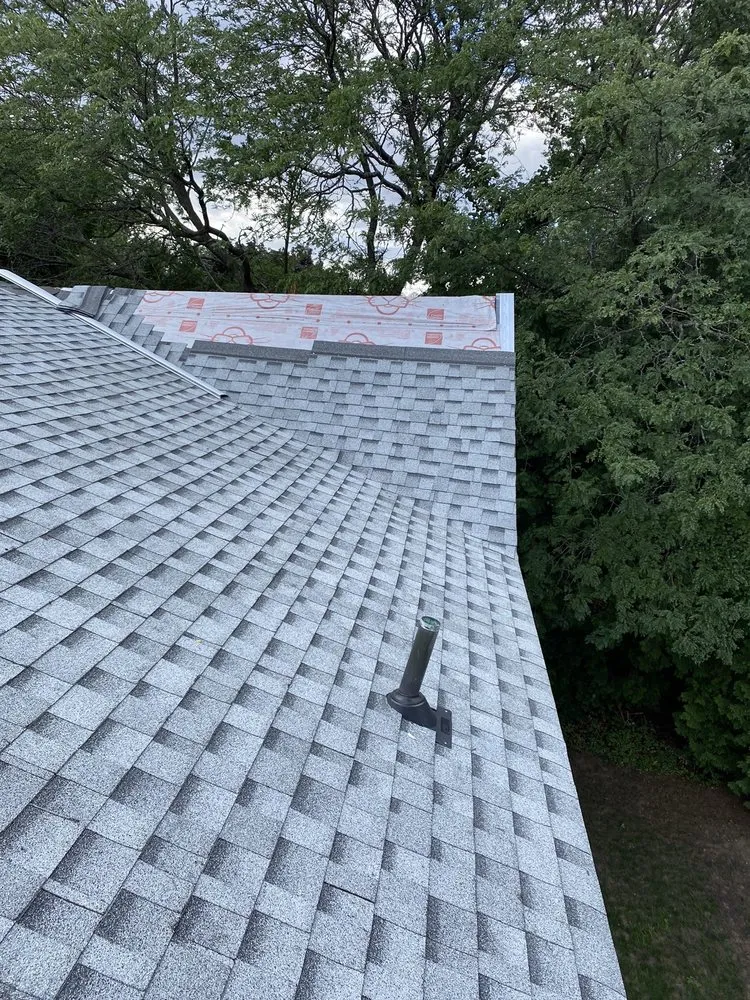 Slide of Al Smith Roofing