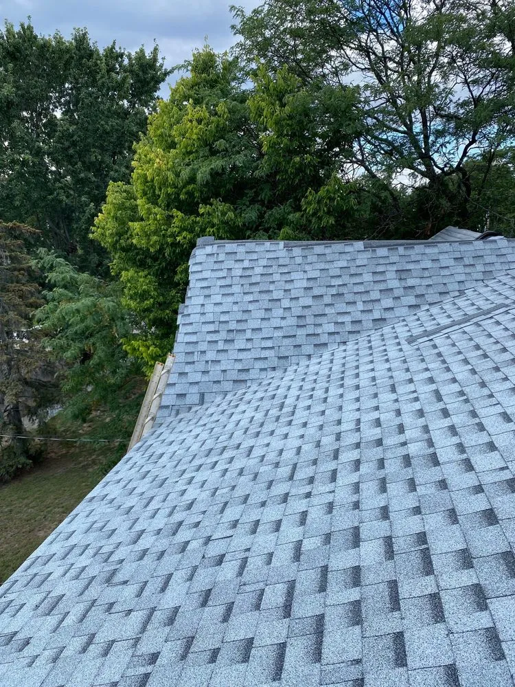 Slide of Al Smith Roofing