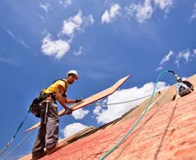 Slide of Aladdin Roofing