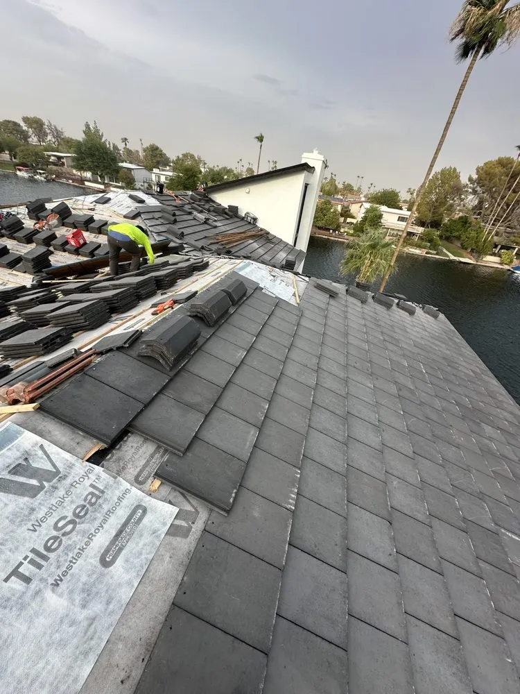 Slide of Alan Roofing