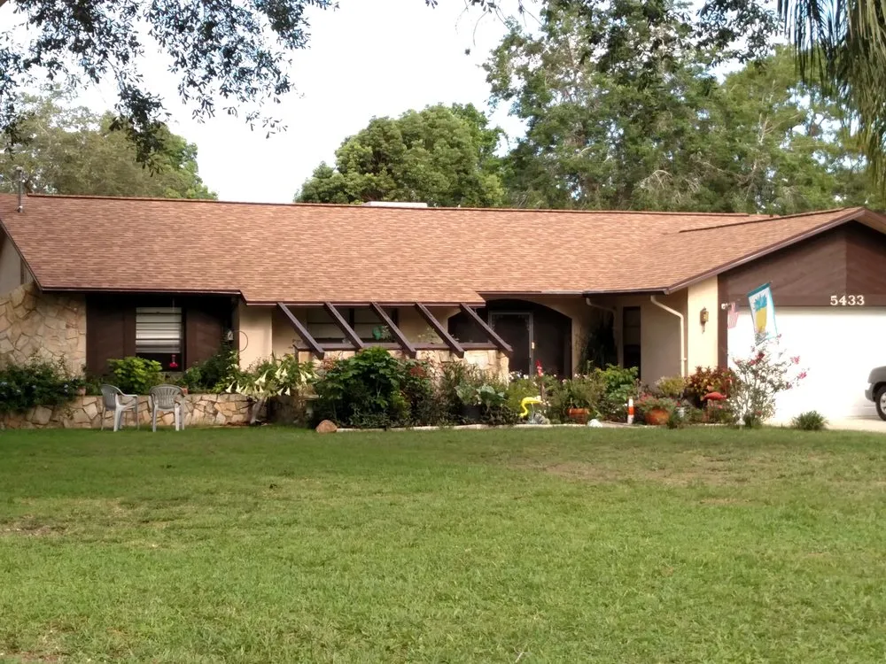 Slide of Alan's Roofing