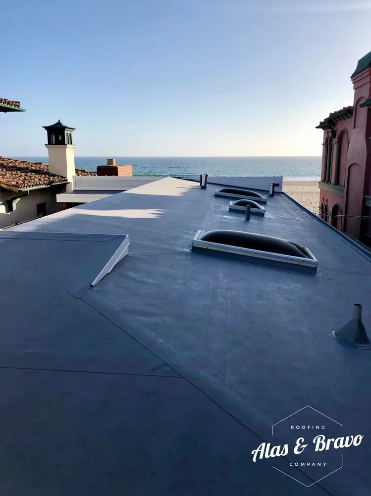 Slide of Alas & Bravo Roofing Company