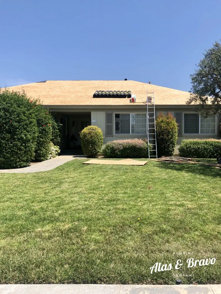 Slide of Alas & Bravo Roofing Company