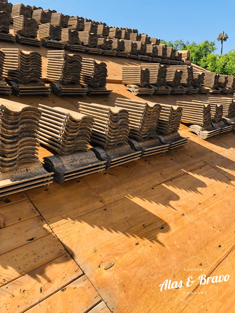 Slide of Alas & Bravo Roofing Company