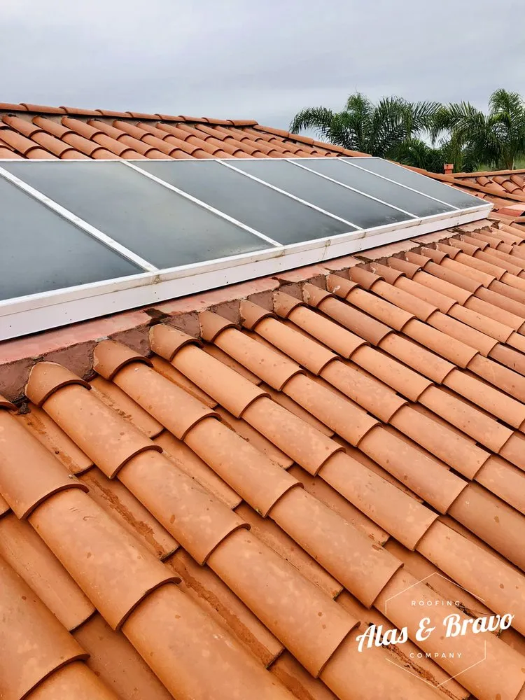 Slide of Alas & Bravo Roofing Company