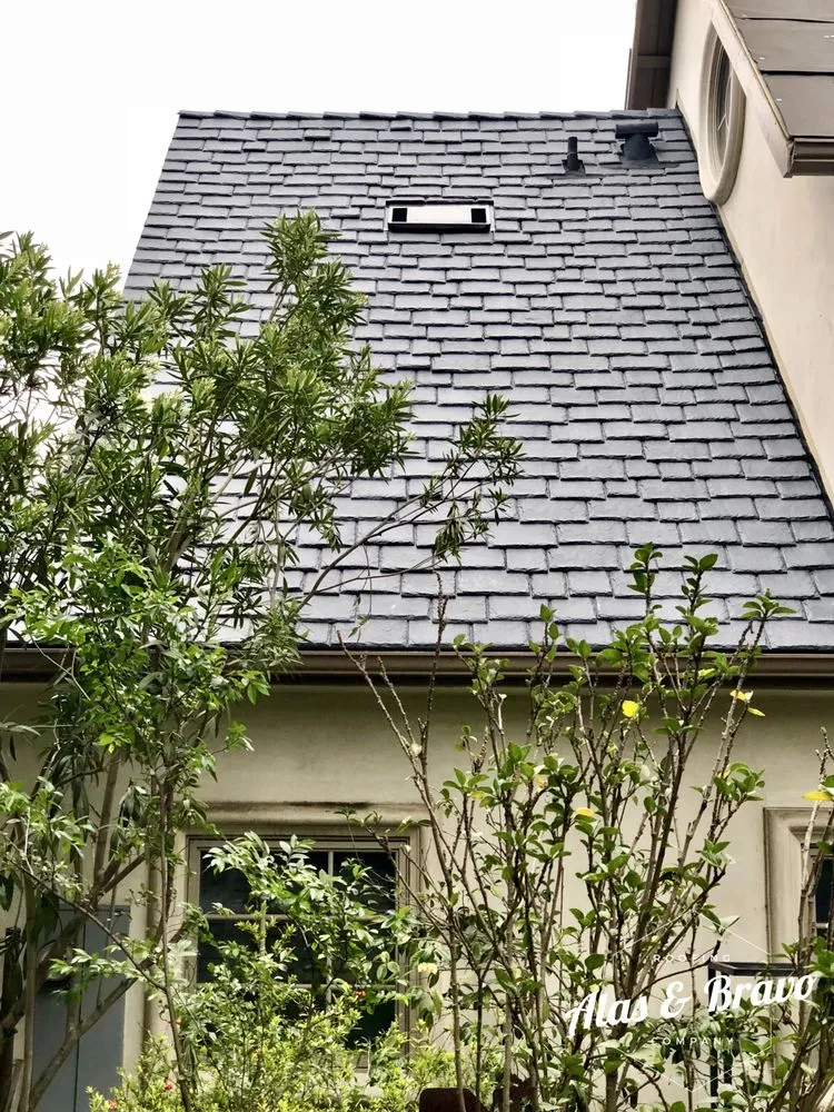 Slide of Alas & Bravo Roofing Company