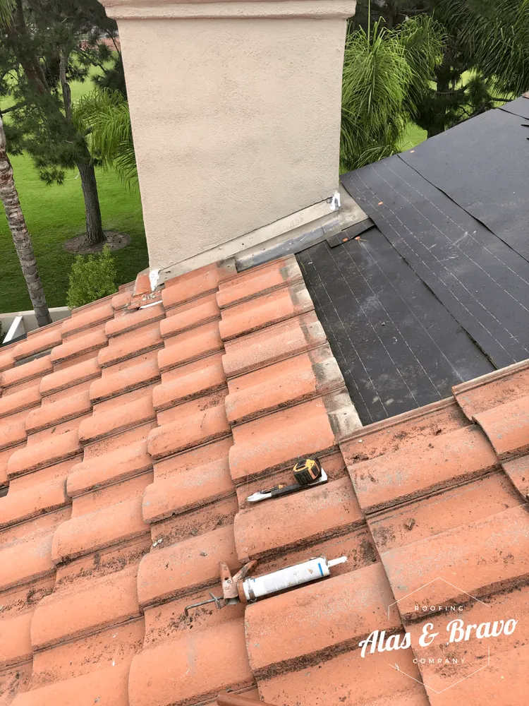 Slide of Alas & Bravo Roofing Company