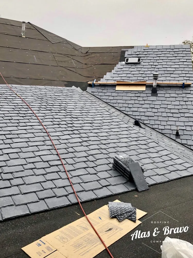 Slide of Alas & Bravo Roofing Company