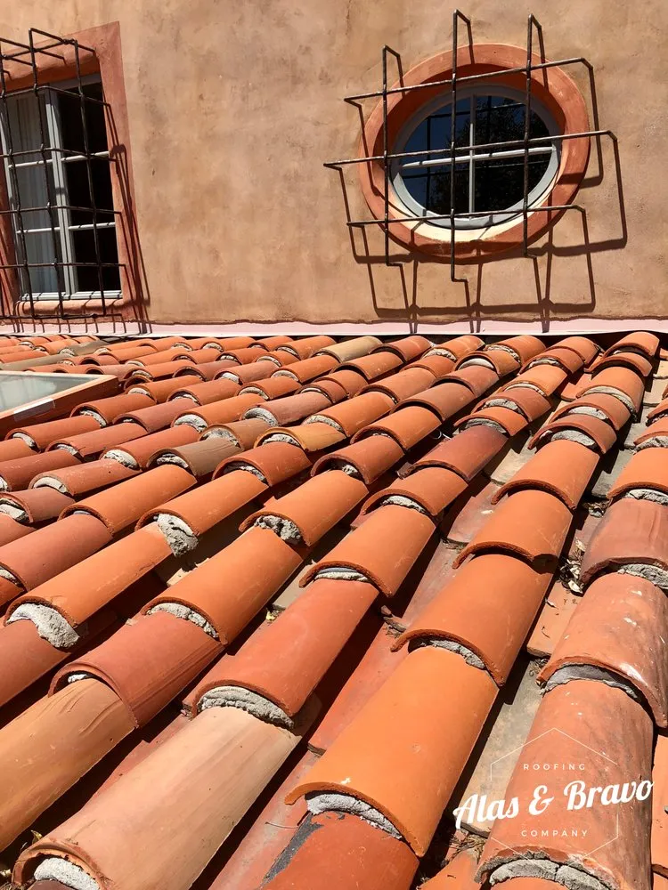 Slide of Alas & Bravo Roofing Company