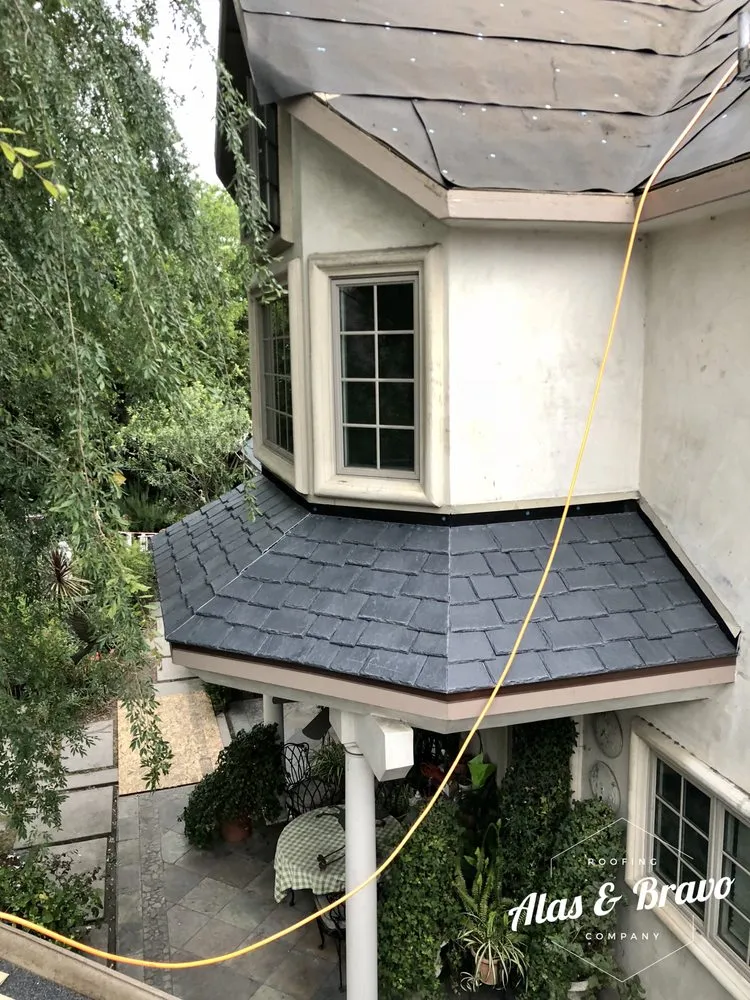 Slide of Alas & Bravo Roofing Company