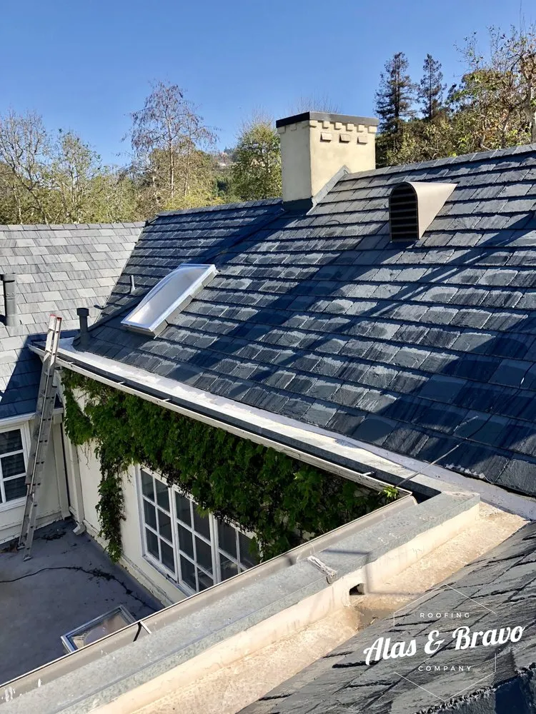 Slide of Alas & Bravo Roofing Company