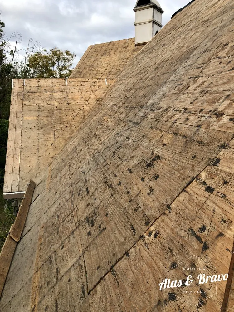 Slide of Alas & Bravo Roofing Company