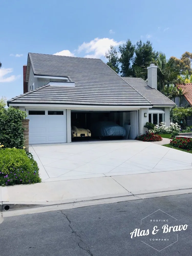 Slide of Alas & Bravo Roofing Company