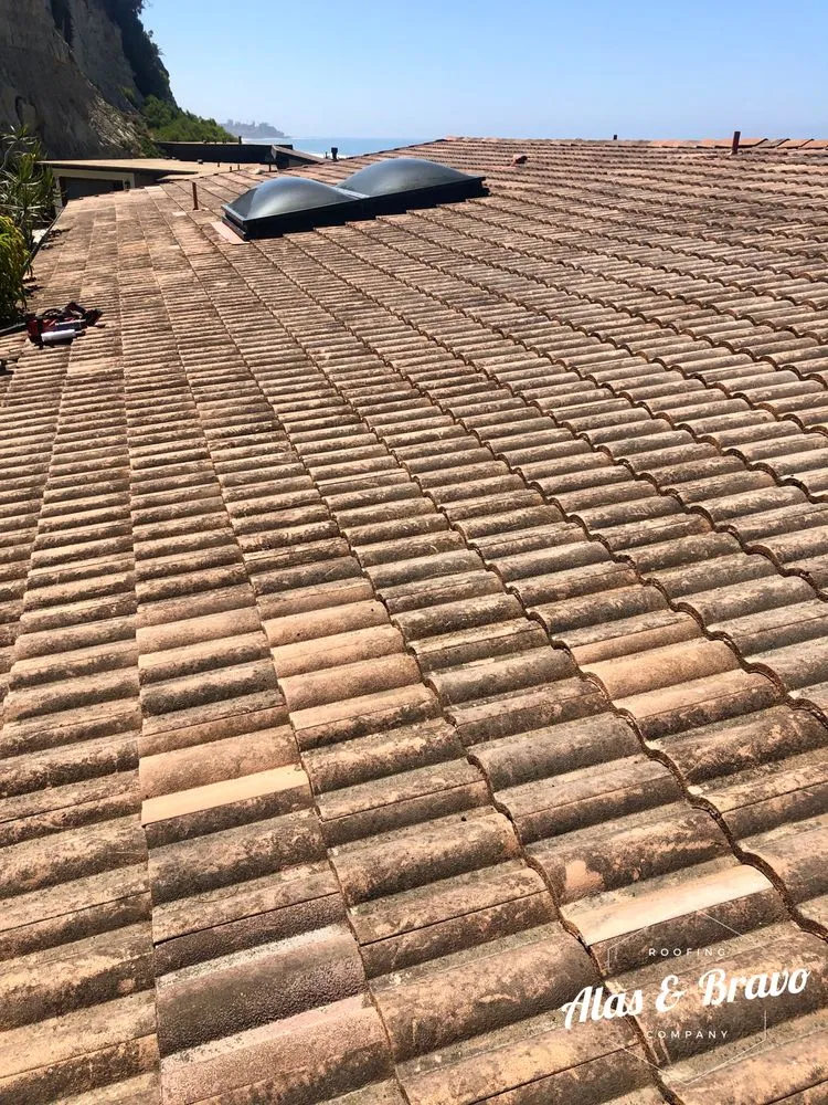 Slide of Alas & Bravo Roofing Company