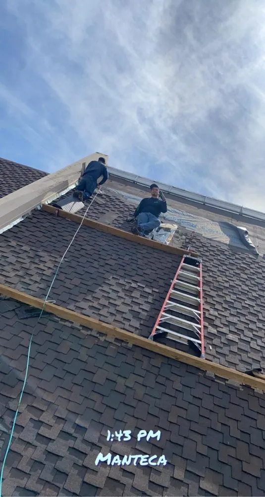 Slide of Albas Roofing