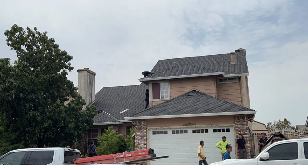 Slide of Albas Roofing