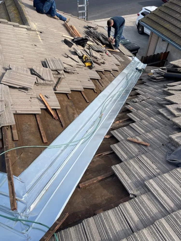 Slide of Albas Roofing