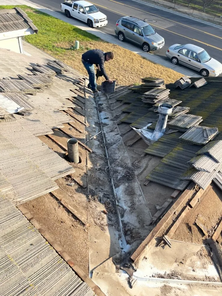 Slide of Albas Roofing