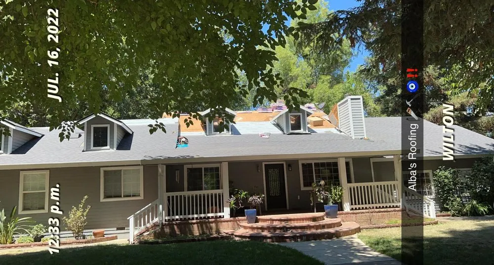 Slide of Albas Roofing