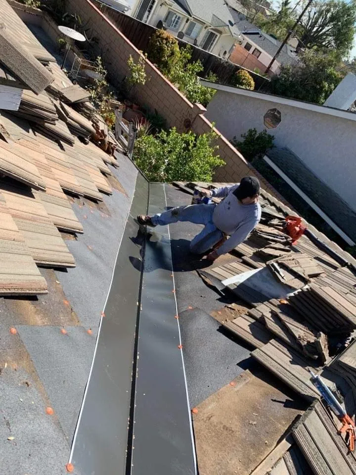 Slide of Alcantar Roofing