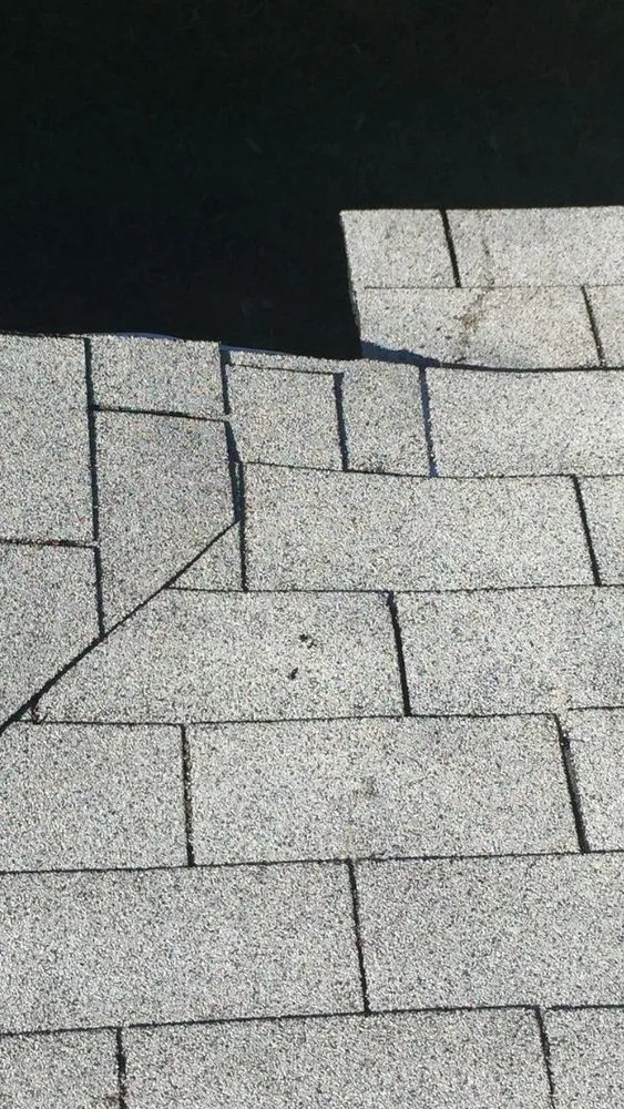 Slide of Alden Roofing