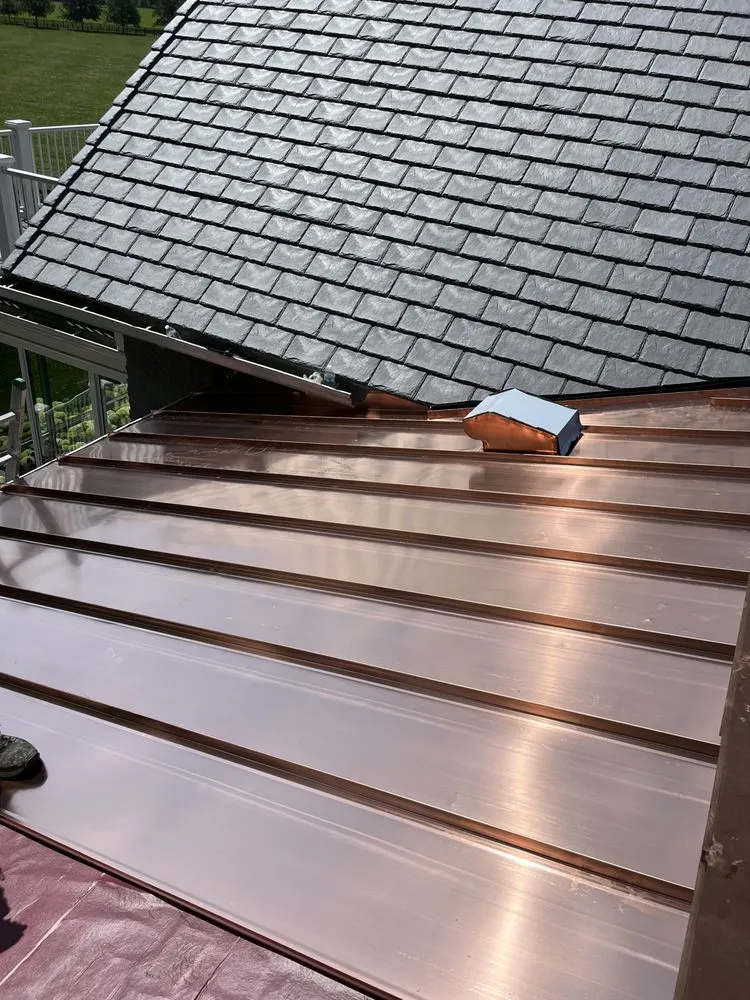 Slide of A.L.E Roofing