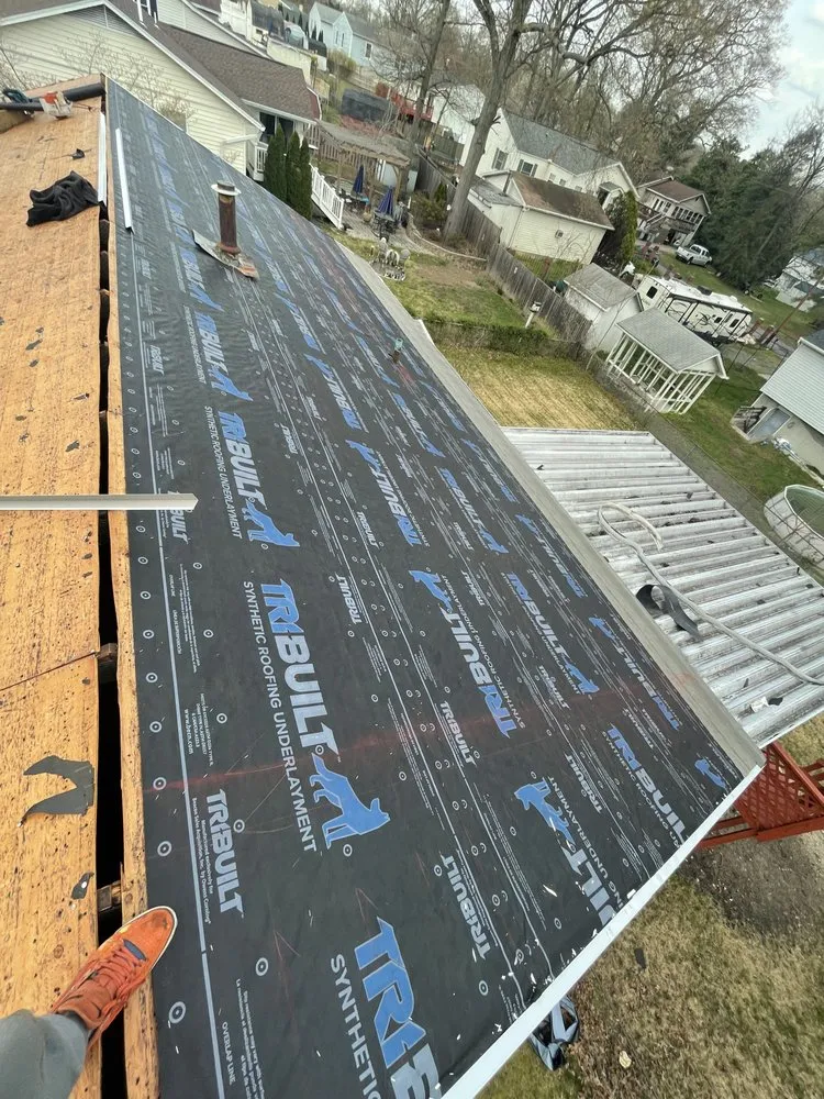 Slide of Alex Exterior Service