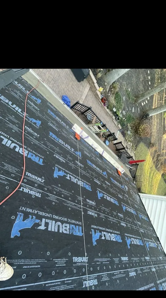 Slide of Alex Exterior Service