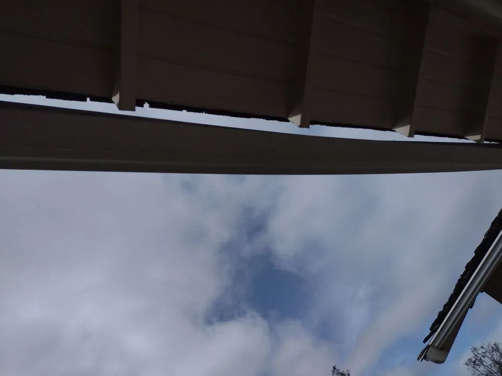 Slide of Alex Gutter & Roof