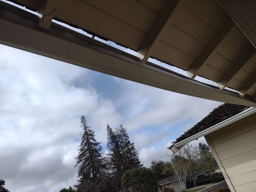 Slide of Alex Gutter & Roof