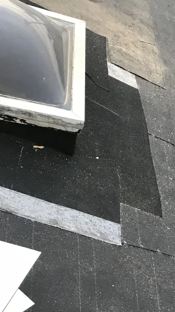 Slide of Alex Gutter & Roof