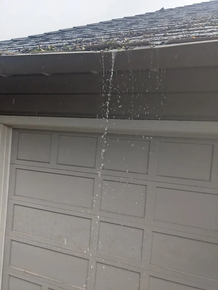 Slide of Alex Gutter & Roof