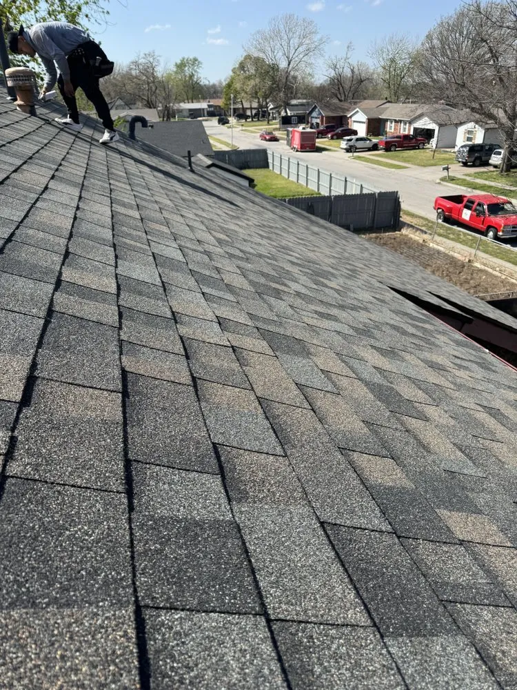 Slide of Alex roofing and construction