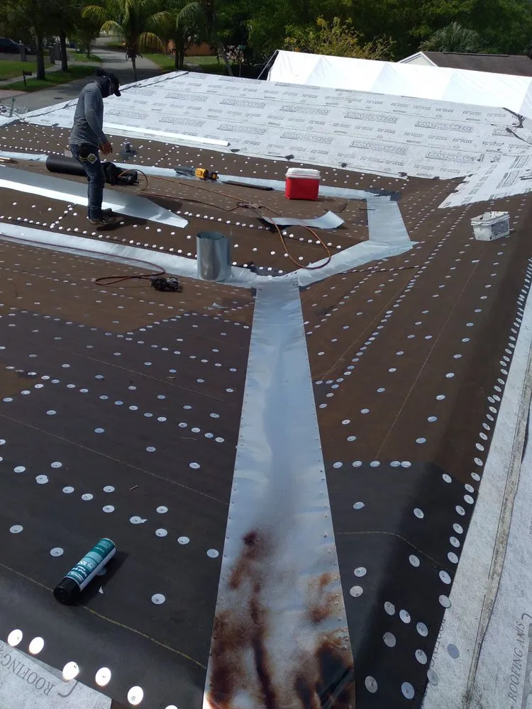 Slide of Alex Roofing