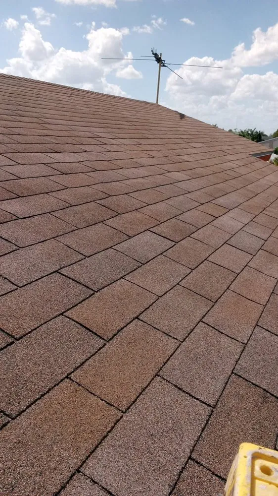 Slide of Alex Roofing