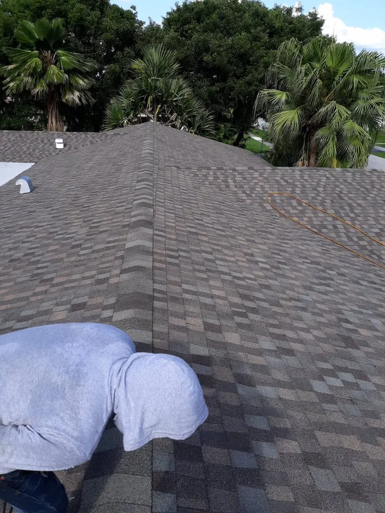 Slide of Alex Roofing