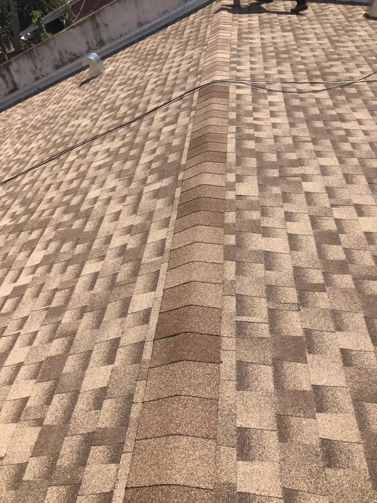 Slide of Alex Roofing