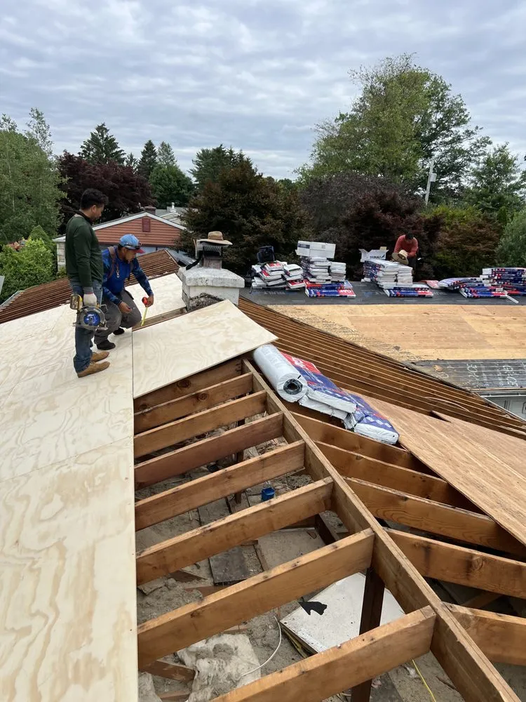 Slide of Alex Roofing Solutions