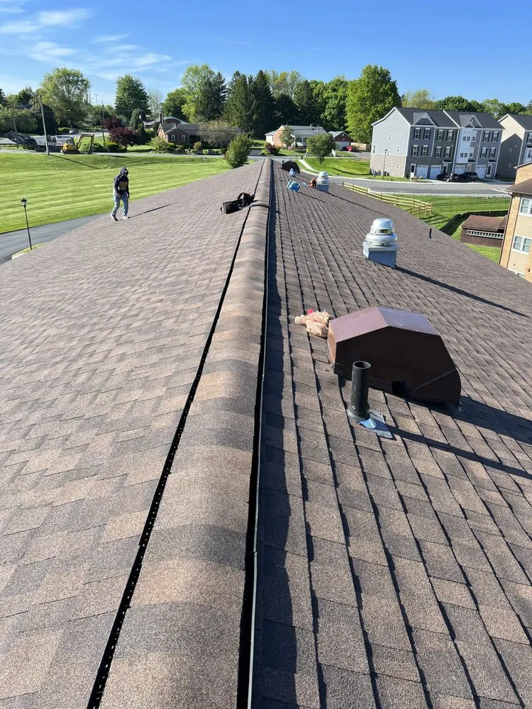 Slide of Alex Roofing Solutions