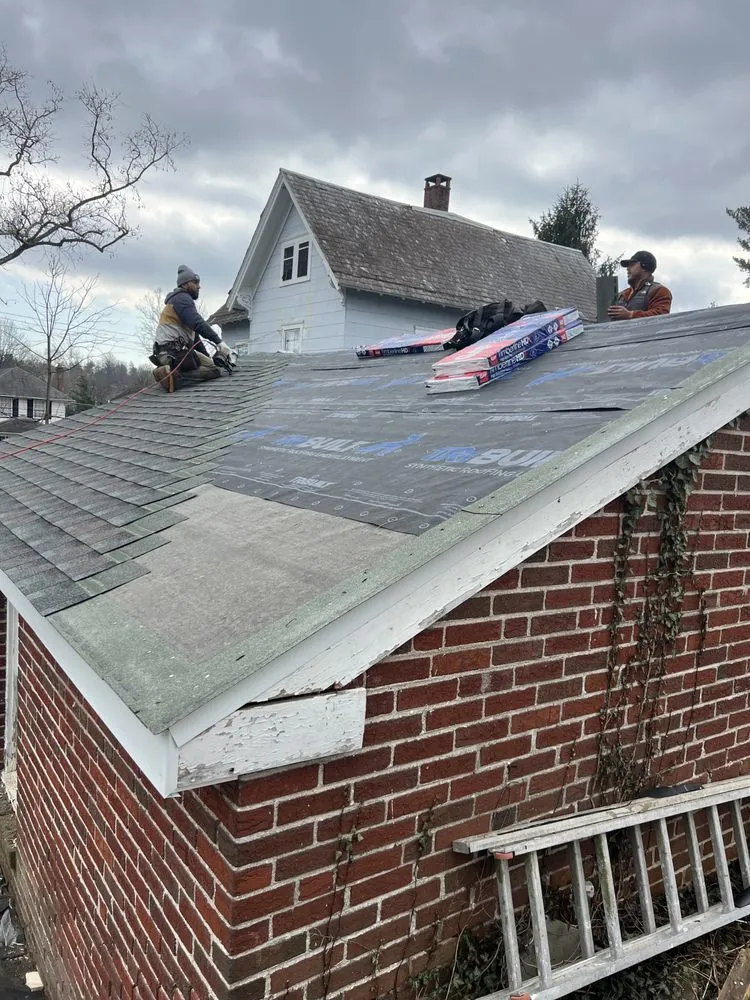 Slide of Alex Roofing Solutions