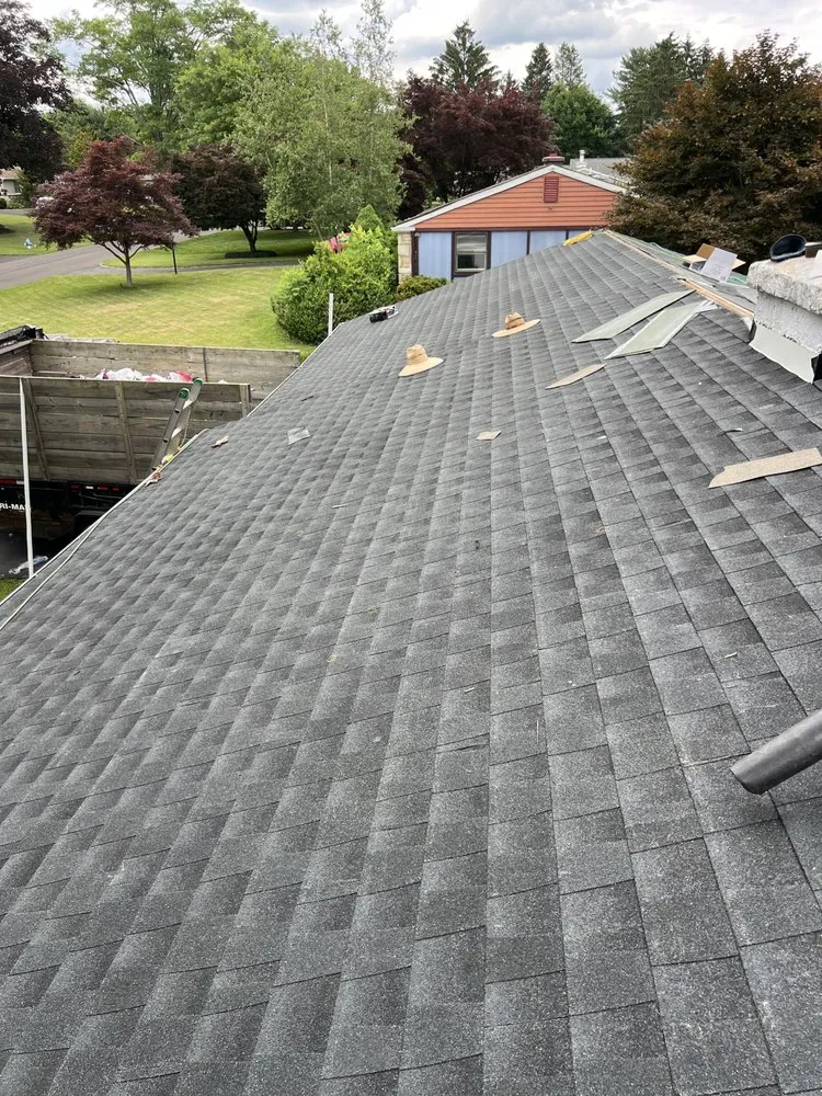 Slide of Alex Roofing Solutions