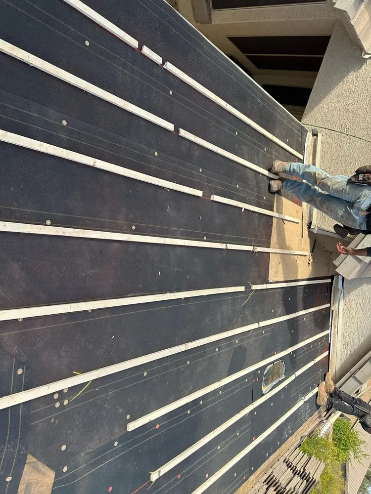 Slide of Alex Stewart Roofing