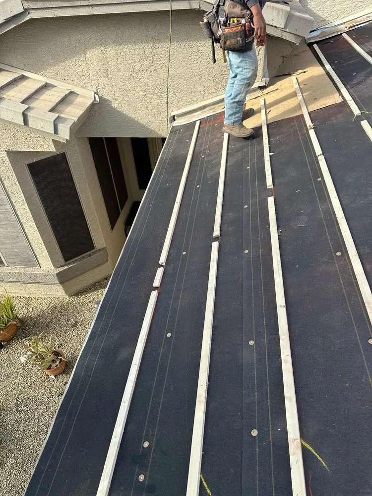 Slide of Alex Stewart Roofing