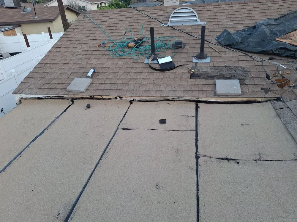 Slide of Alexander’s Roofing