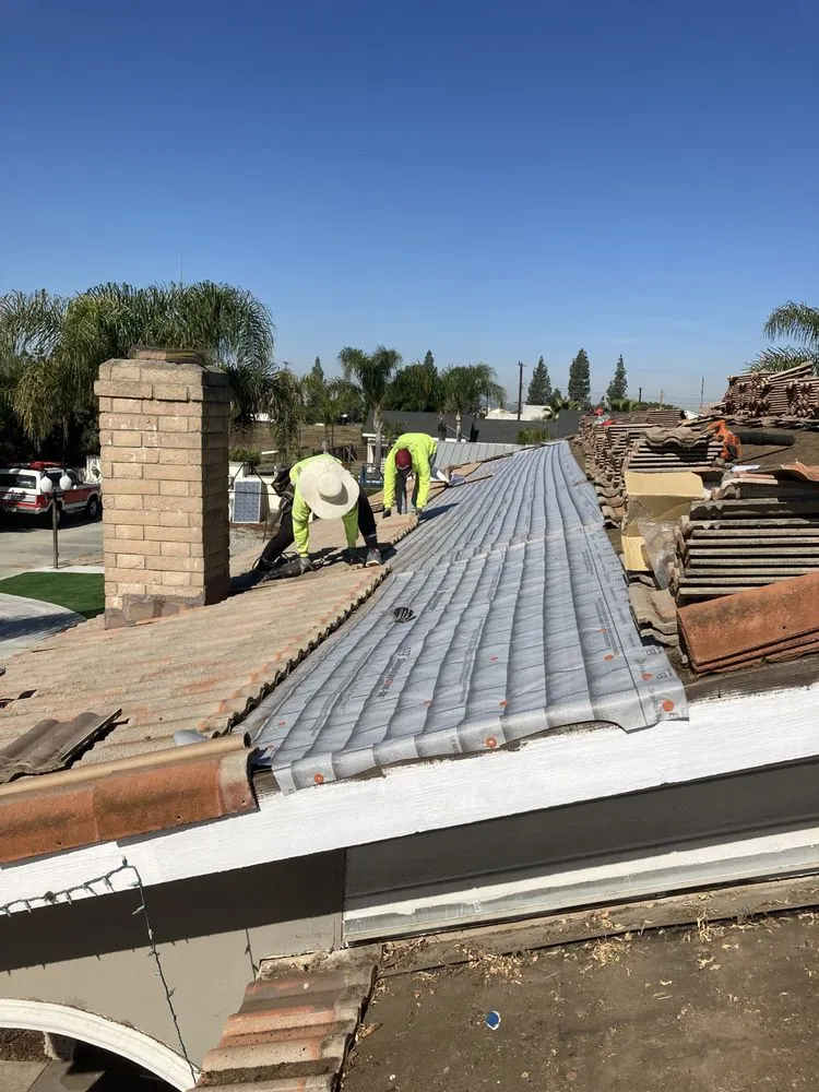 Slide of Alexander’s Roofing