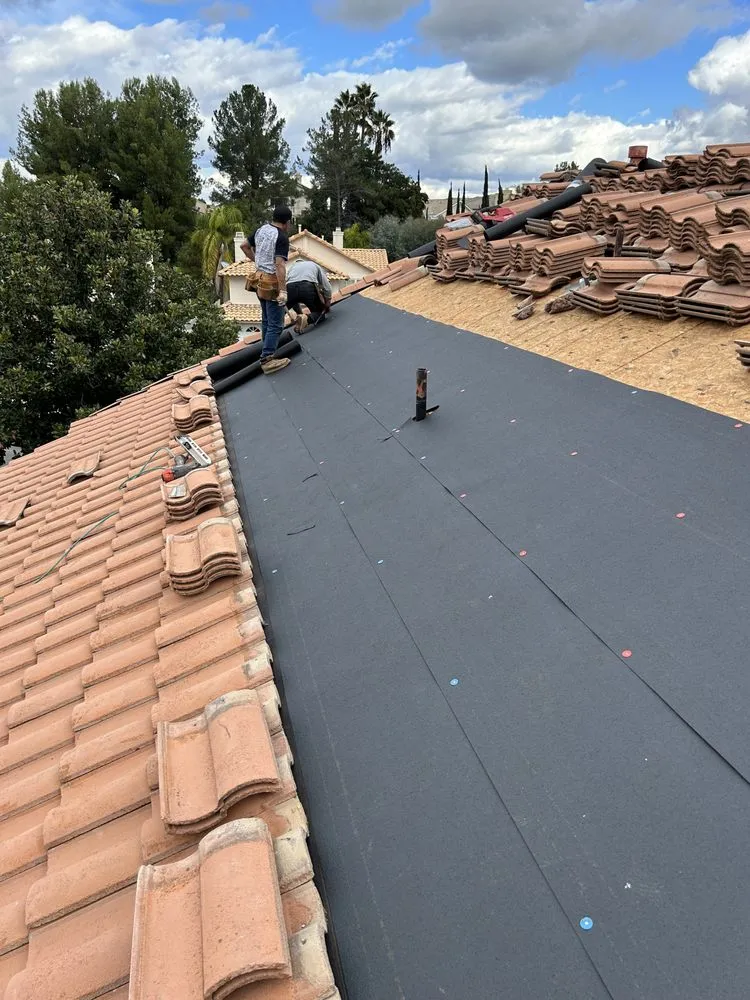 Slide of Alexander’s Roofing