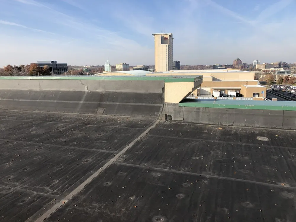 Emergency storm damage roof repair with free inspection in Stilwell, KS by Alexanders Roofing