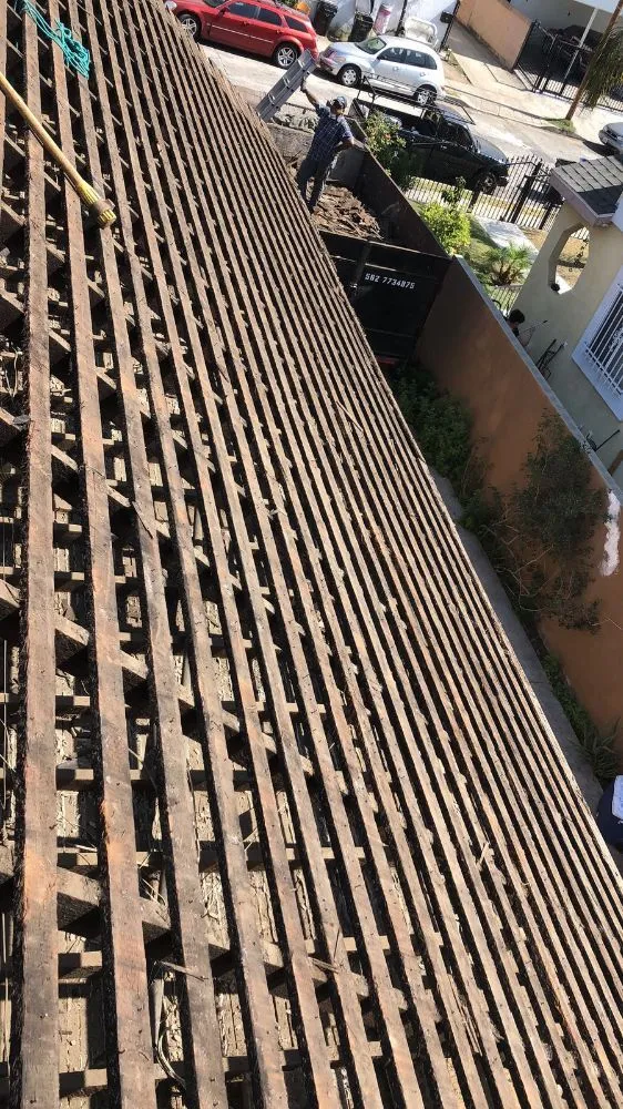 Slide of Alex's Hauling & Demo