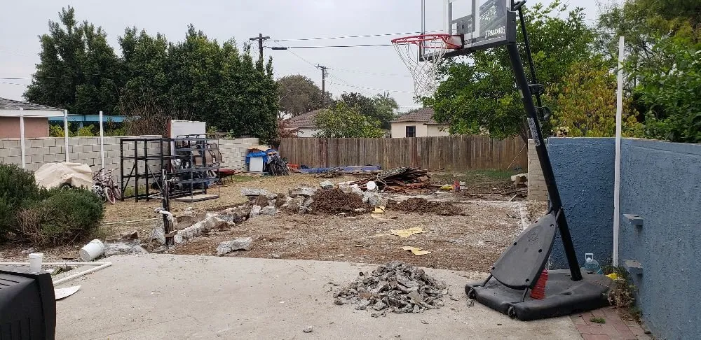 Slide of Alex's Hauling & Demo