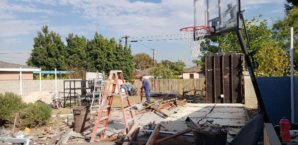 Slide of Alex's Hauling & Demo